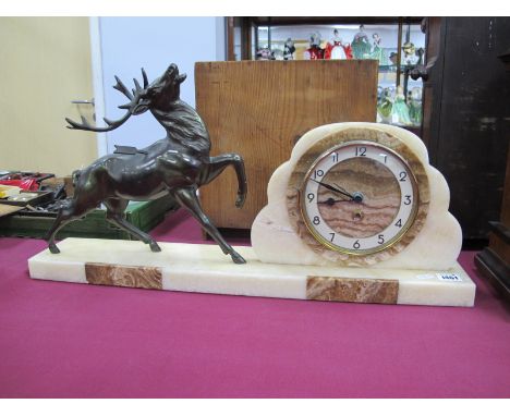 An Art Deco Mantle Clock, with surmounted spelter wounded stag, later movement, 65cm long.
