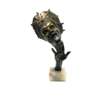 A Mid XX Century Bust, with raised hand, wearing a mask and head piece, the marble rectangular base signed indistinctly (R. F