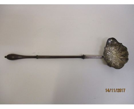 A George III silver toddy ladle by Thomas Streetin, London 1817, having a lobedl bowl with embossed and chased, floral decora