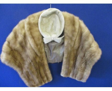 A vintage mink stole, approximately 45 in length and a vintage Marshall & Snellgrove child's hat with a bow