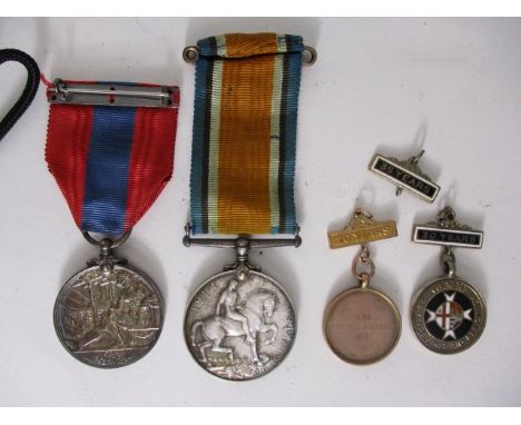 A Great War medal to 102116 private W R Goodman, Machine Gun Corps, a George V Faithfull Service medal to Harry George Hicks 