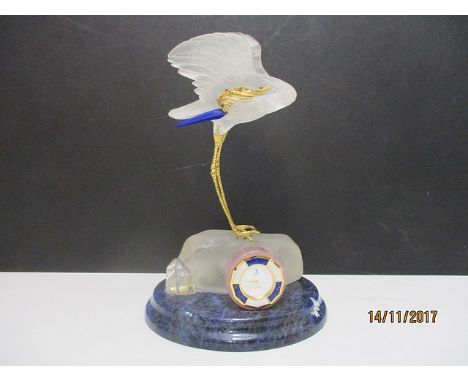 A Boucheron style crystal and gold plated model of a crane, its crest inset with diamonds, emeralds, rubies and sapphires, st