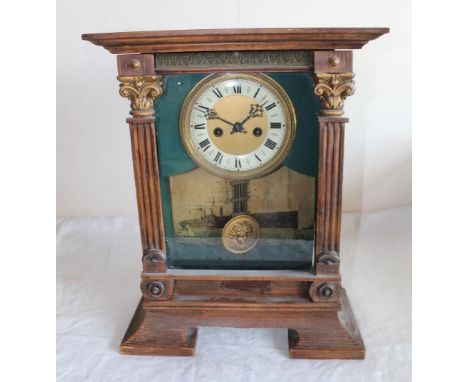 C19th mantel clock twin train keywind movement striking on s gong, stained pine case with applied paddle steamer print, H44cm