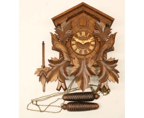 Hubert Herr, Triberg, Germany - Late C20th Black Forest Cuckoo clock, stained and carved light wood case, signed two train we