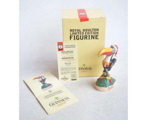 Royal Doulton MCL6 limited edition Guinness "Christmas Toucan" ceramic figurine (1310/2000) in slightly dusty but otherwise m