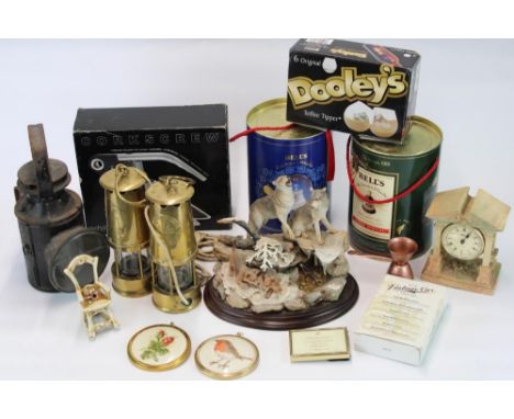 Two Protector lamp and Lighting Co. Ltd type 6 miners safety lamps, a Railwayman's signal lamp. two sealed Bells whiskey deca