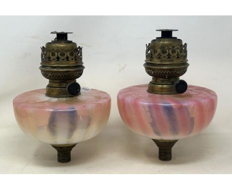 A pair of Vaseline glass oil lamp reservoirs, 17 cm diameter (2)