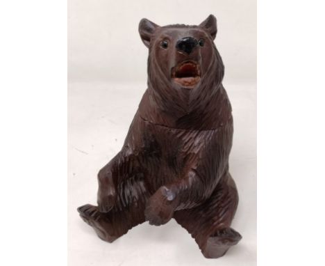 A Black Forest style carved bear caddy, 22 cm high