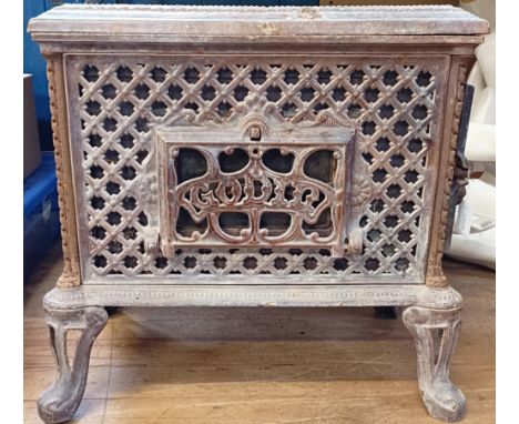 A Godin Chauffette brown enamel stove, 55 cm wide, with flue section and cockerel cowl (3)