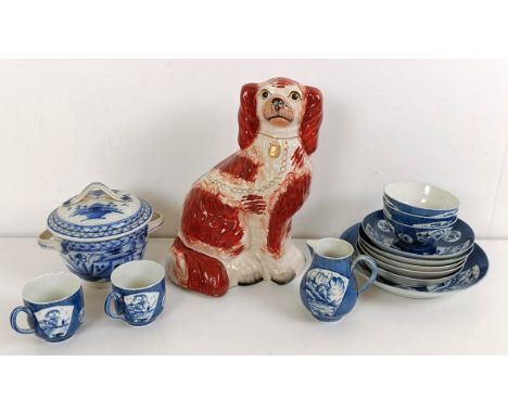 A Worcester blue and white part service, a Staffordshire spaniel, and assorted blue and white ceramics (box)One tea cup chipp