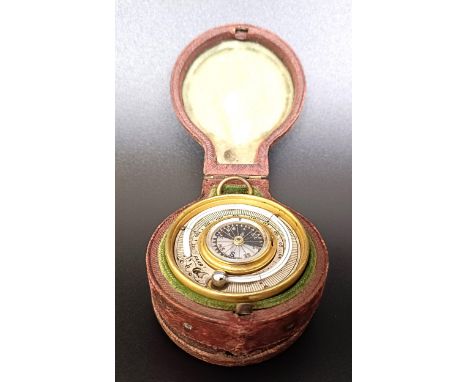 A good late 19th/early 20th century pocket combined barometer, thermometer and compass, in a leather case