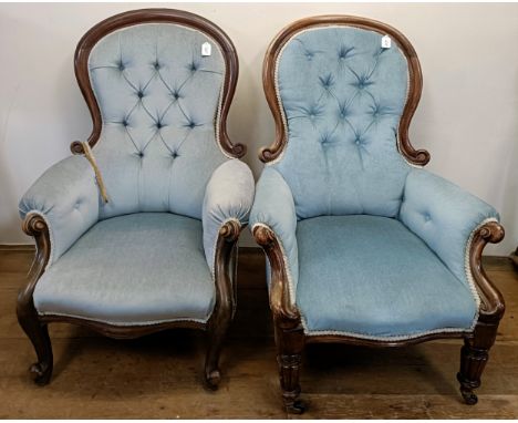 A Victorian mahogany framed button back armchair, and another similar (2)