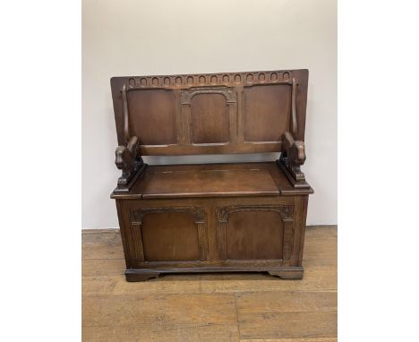 An oak monk's bench, 110 cm wide, a dresser, a drop leaf table, a radio, a waterfall bookcase, and a tambour front desk (6)