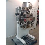 Kaps-All capper Model E. With feeder system Model FSRF-24 in good working condition 120 volts 1