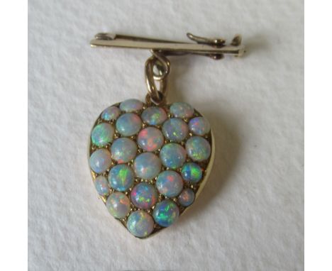 A yellow gold opal heart pendant, suspended on gold bar, the heart set all over the front with 23 cabochon opals, weight 5.9g