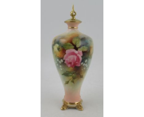 A Royal Worcester covered vase, decorated with roses by Bray, shape number F106, height 10.25ins Condition Report:   The cove
