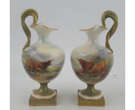 A pair of Royal Worcester ewers, with entwined snake handles, decorated with Highland cattle in landscape by H Stinton, shape