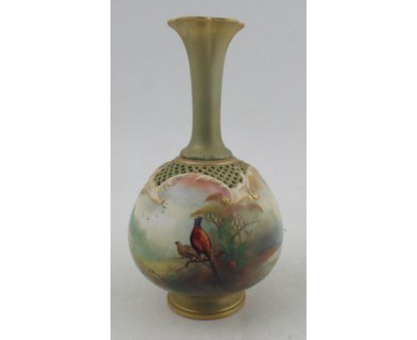 A Royal Worcester vase, with piercing to the shoulders and decorated all round with pheasants in landscape by Southall, shape