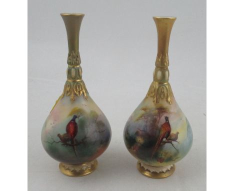 A pair of Royal Worcester vases, decorated all round with pheasants in trees, shape number H304, height 6.5ins