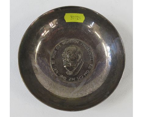 An A E Jones silver circular dish, with a Winston Churchill commemorative portrait, weight 6oz