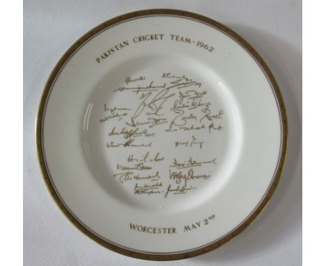 A Royal Worcester cricket plate, The Pakistan Cricket Team 1962, in gilt, diameter 10.5ins