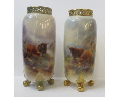 Two similar Royal Worcester vases, with full panels of Highland cattle by H Stinton, to a pierced boarder, raised on four knu