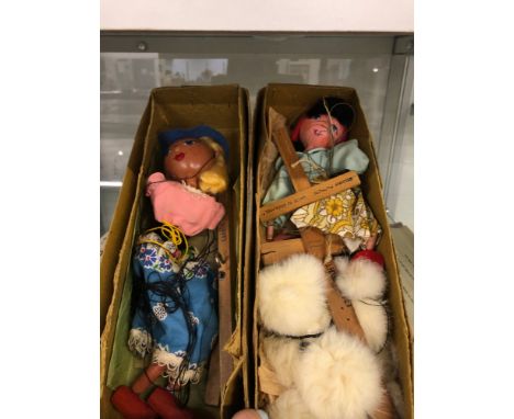 A BOXED PELHAM PUPPET GIRL AND ANOTHER OF A BOY
