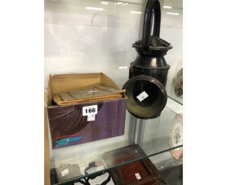 VELOCETTE PARTS AND INSTRUCTION BOOKS TOGETHER WITH AN OIL LANTERN