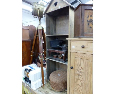 A BRASS SEARCH LIGHT STANDARD LAMP, A PINE BEDSIDE CABINET AND A SMALL SHELF UNIT (3)