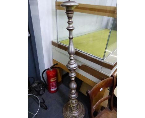 A SILVERED TURN WOOD STANDARD LAMP