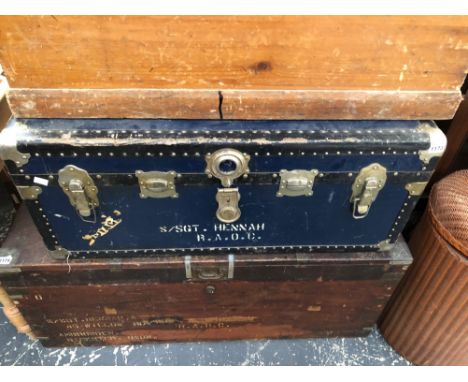 A VINTAGE METAL BOUND CABIN TRUNK 