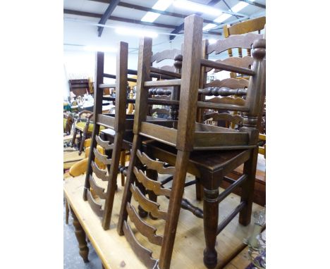 A SET OF SIX OAK LADDER BACK SIDE CHAIRS