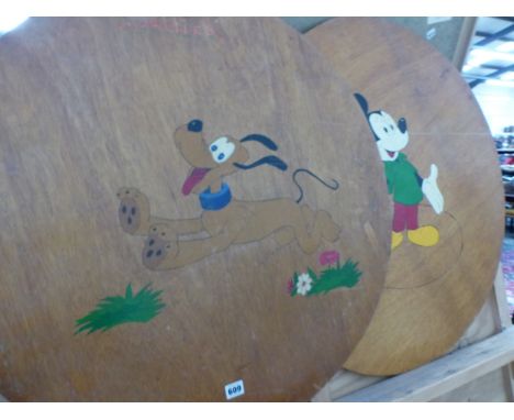 TWO WOODEN TABLE TOP COVERS PAINTED WITH MICKEY MOUSE AND PLUTO DISNEY FIGURES. 