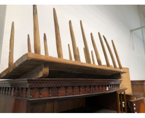 A VINTAGE RUSTIC SPIKED TOOL