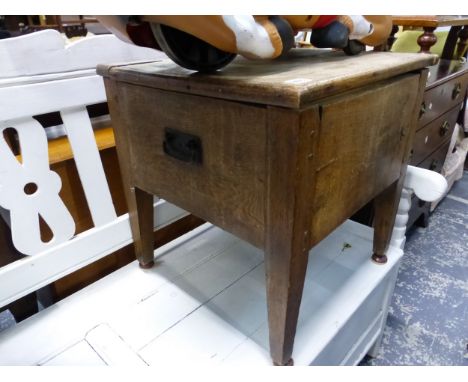 A GEORGIAN OAK COMMODE
