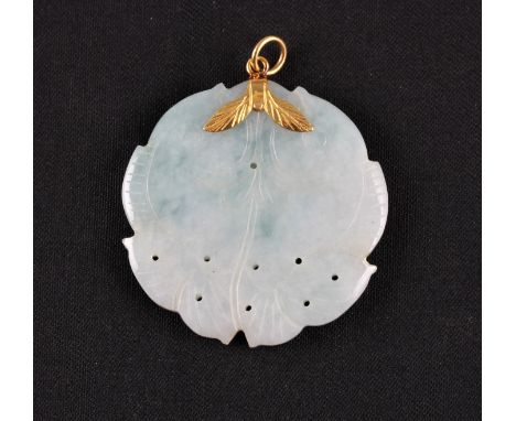 A green jadeite jade pendant, engraved with fish design, unmarked yellow metal mount, diameter approx. 4.8cm.