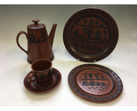 A Royal Worcester Crown ware Scottie Wilson pattern tea service, including tea pot, tea cups and saucers (one AF), side plate