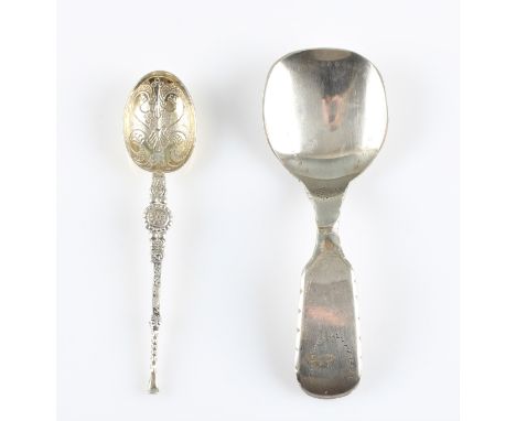 A Georgian caddy spoon, stamped with lion passant rest of hallmark rubbed, together with a hallmarked silver anointing spoon.