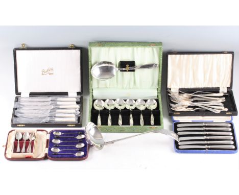 A collection of EPNS flatware, to include coffee spoons, pickle fork, sugar tongs, fish knives and forks, butter knives, a la