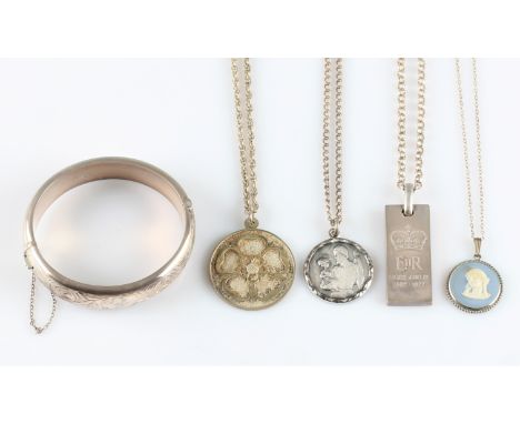 A lot to include a silver hinged bangle with safety chain, hallmarked Chester 1959, together with a hallmarked silver and Wed