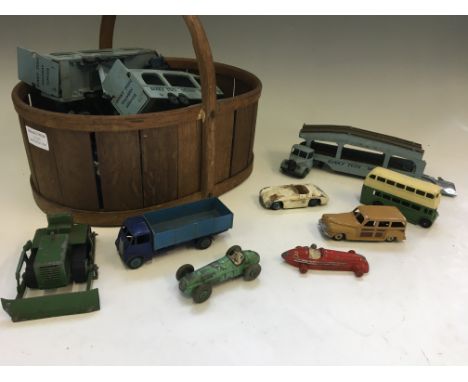 A selection of various Dinky Toys, including Delivery Service trucks, Alfa Romeo, Cooper Bristol, Austin Healey, buses, farmy