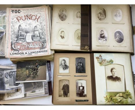 Two albums of Victorian portrait photographs, together with an album of postcards, other loose postcards and stamps, and a co