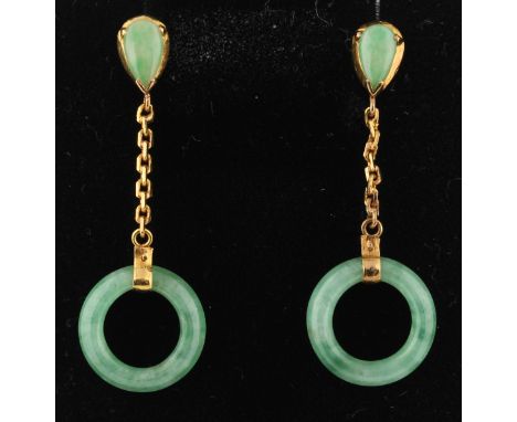 A pair of jade dropper earrings, each featuring a circular piece of carved jade suspended from a short length of belcher link