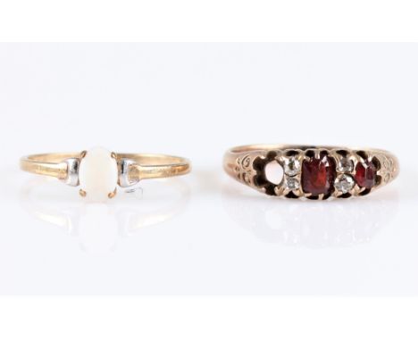 A lot to include an opal single stone ring, stamped 9ct, together with a garnet and diamond ring (A/F), ring sizes P, (2).