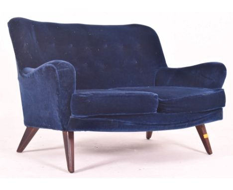 A Scandinavian inspired vintage 20th century velvet upholstered &amp; teak two seater sofa. The sofa having a buttoned back w