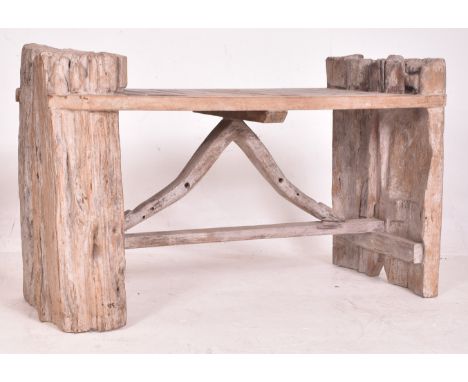 A vintage bespoke made white painted &amp; weathered tree trunk garden outdoor bench. The bench having tree trunk sections as