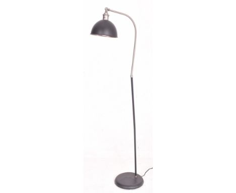 John Lewis - a contemporary designer floor standing lamp light. The lamp having a pendant shade supported by a single curved 