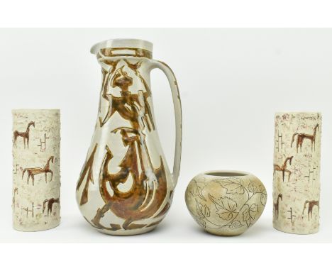 A collection of four pieces of vintage mid century circa 1960s studio pottery stoneware ceramic items. The lot comprising a p
