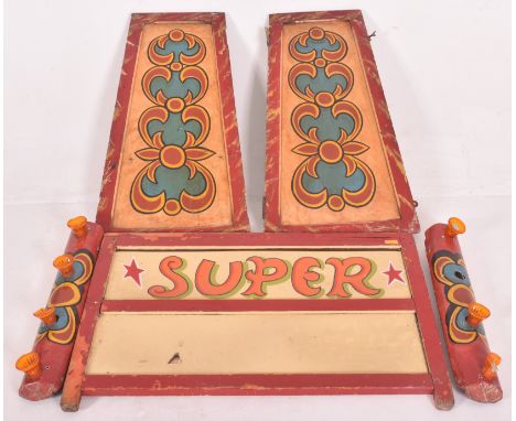 Five vintage fairground / funfair / amusement park light and hand painted decorative wooden panels. The lot comprising a pair