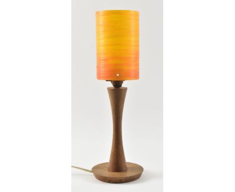 A retro mid 20th century Space Age teak and spun fiberglass table / desk lamp light. The spun fiberglass shade finished in or